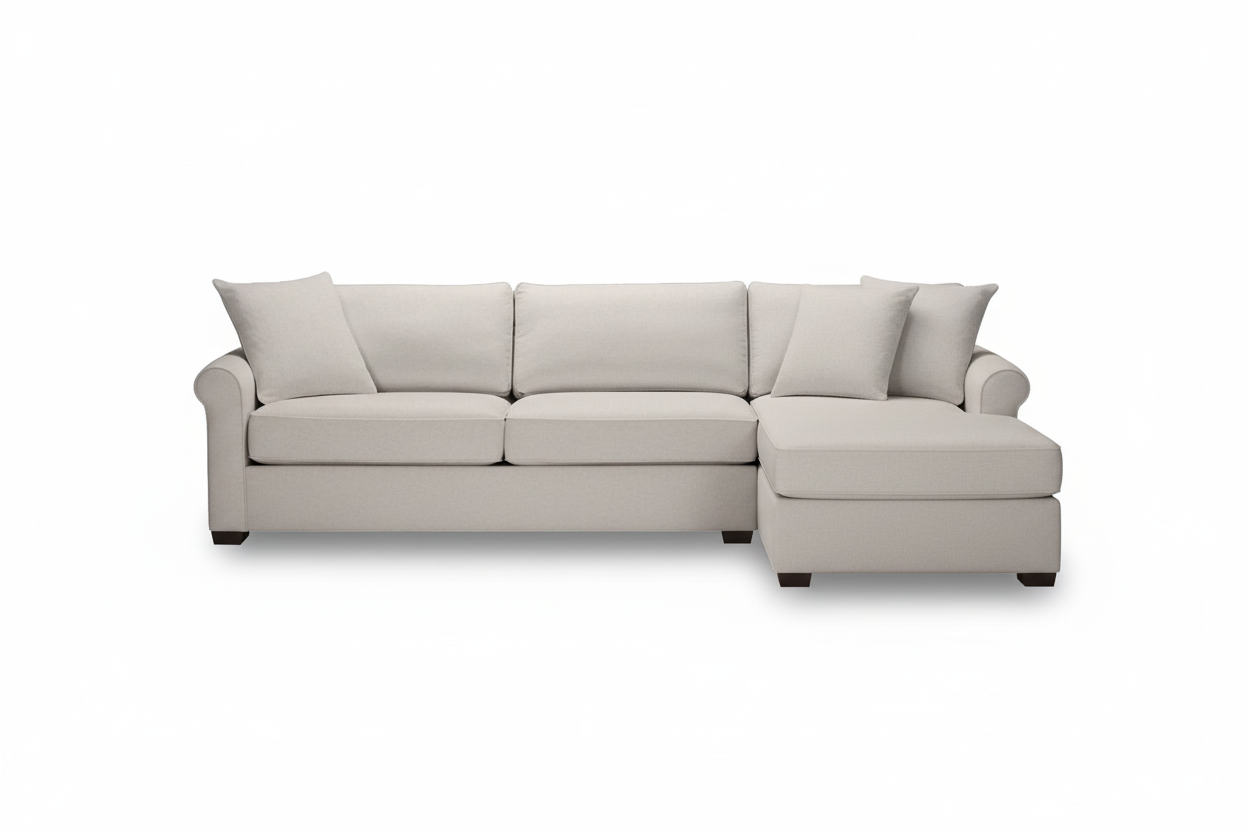 Beige sofa with two cushions on a white background