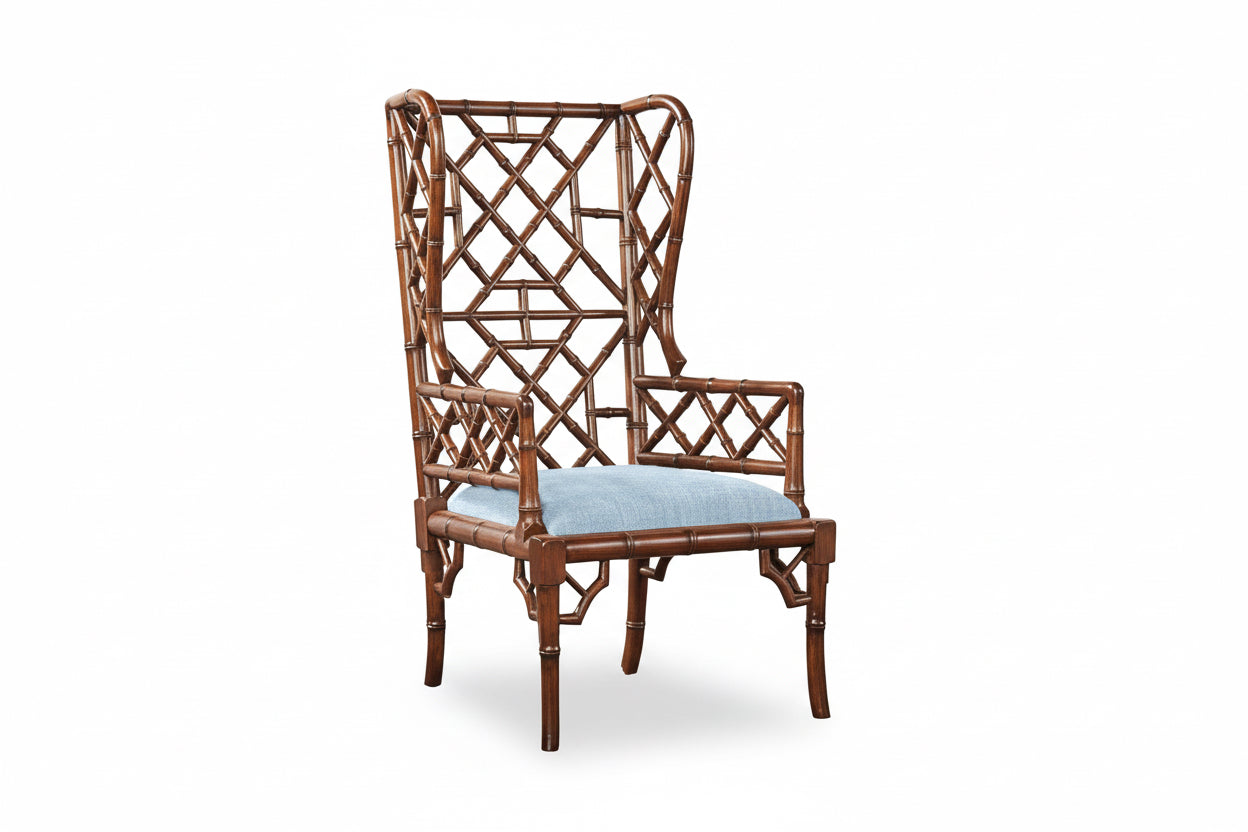 Decorative chair with bamboo  lattice backrest and light blue cushion on a white background
