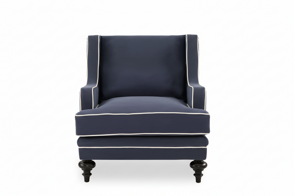 Navy armchair with white trim on a white background