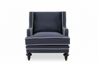 Navy armchair with white trim on a white background