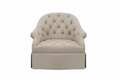 Blue tufted armchair on a white background