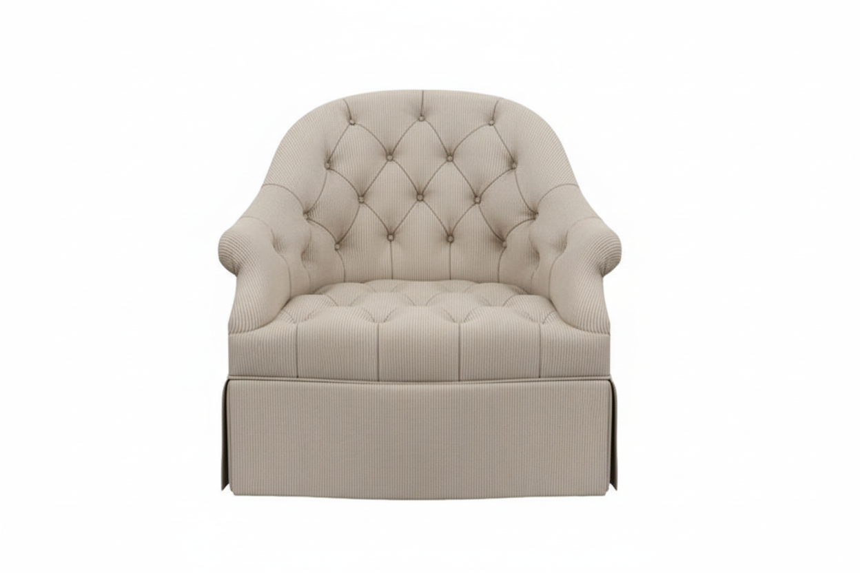Blue tufted armchair on a white background