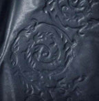 Nuovo Wing Chair with Acantha Sculpted Leather thomas-george-gallery